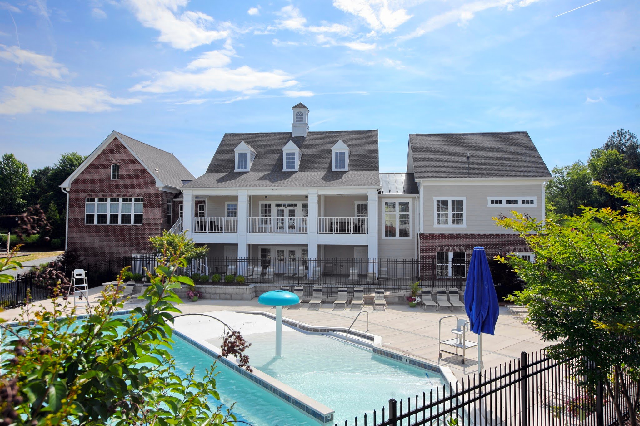 Pool and clubhouse at the Villages of SteepleChase